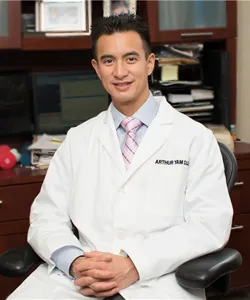 Dr. Yam white coat