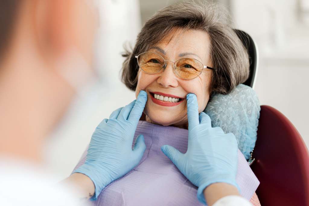 smiling happy beautiful senior woman sitting
