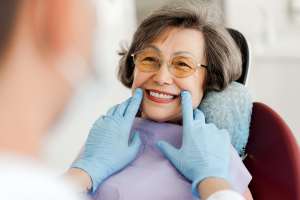 smiling happy beautiful senior woman sitting